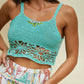 hand knitted crochet top in acqua color with yellow embroidery made by ferdinando fusco sartoria sorrento